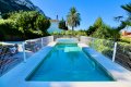 Disfrute de sus vacaciones en Dénia en la Costa Blanca en esta espaciosa villa vacacional para 8 personas, con piscina privada y vistas al mar.